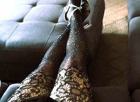 Glittery body suit and stockings.