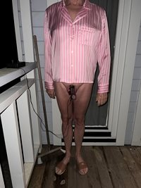 Girly in pink pyjama top and hooked for estim