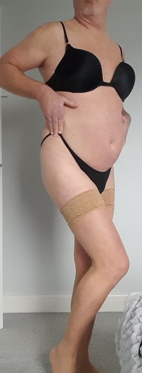 Spending the day in my new hold ups along with bra and panties.