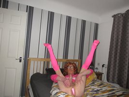Debbie with her new pink butt plug in place