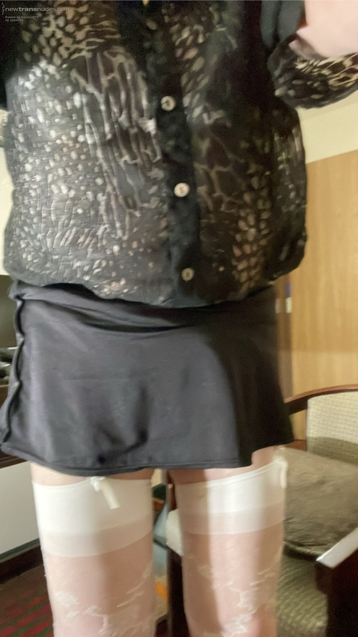 Sandy shows more of her stockings