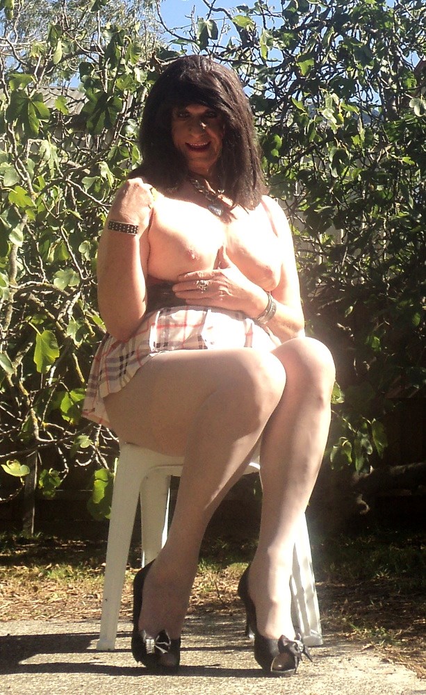 Being busty around my back yard