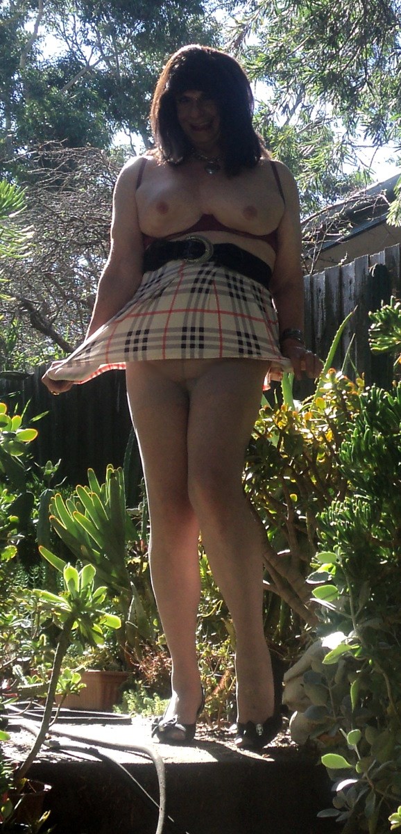 Being busty around my back yard