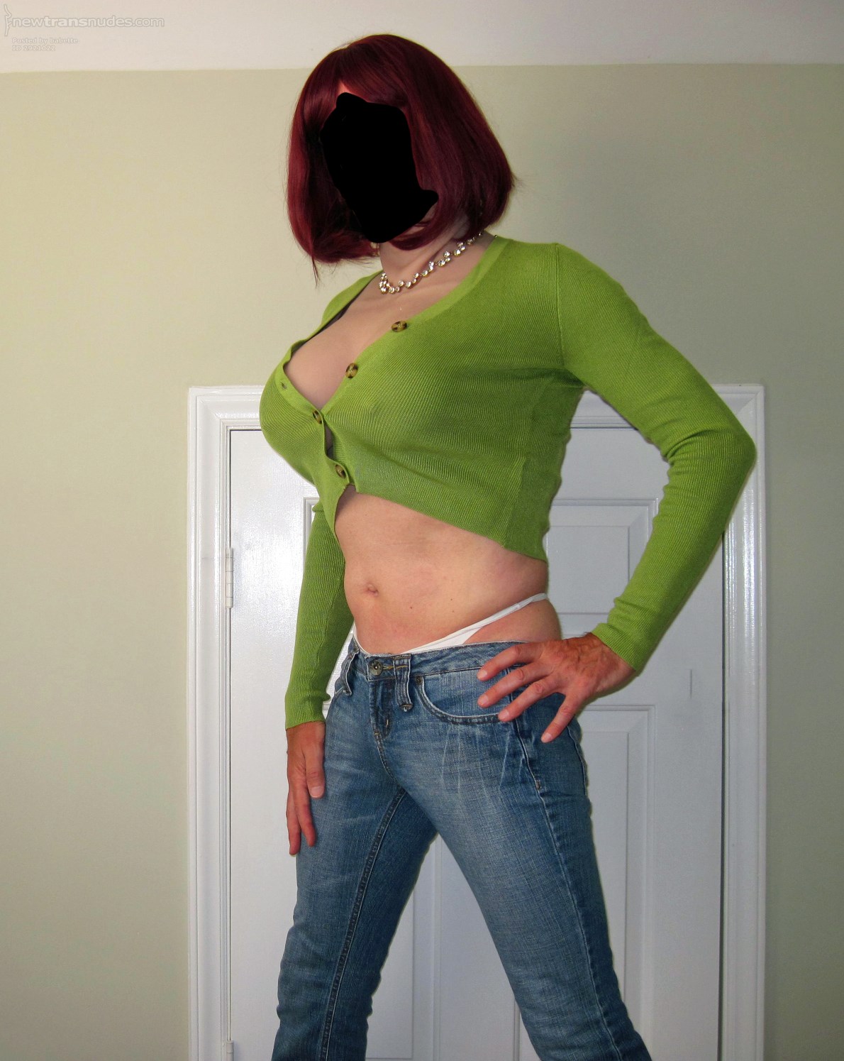 Just two little buttons. Undo them, or just rip my little sweater right off...