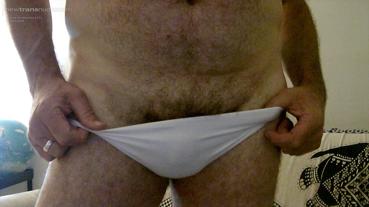 feeling hot n horny  it's 38 degrees here in Spain at 11.45 at night  hence wearing just my red bra and white knickers  got the all the windows open   I think some of the neighbours are having a good old look   I'M GONNA TAKE THESE OFF I THINK