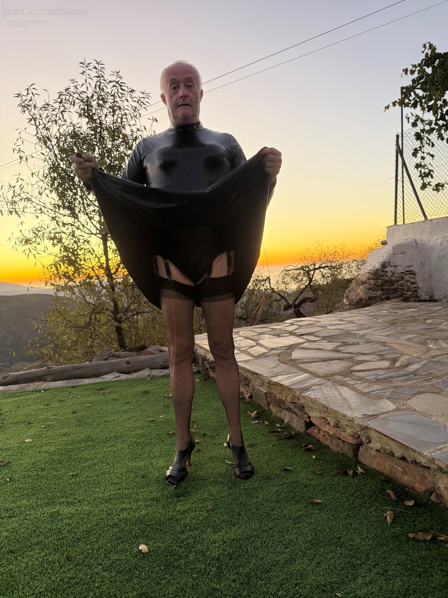 New shiny dress with stockings and heels.