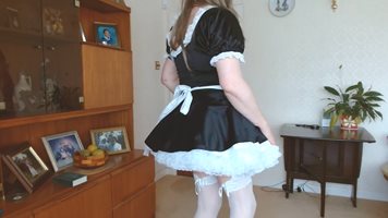 Sissy maid shows her panties.