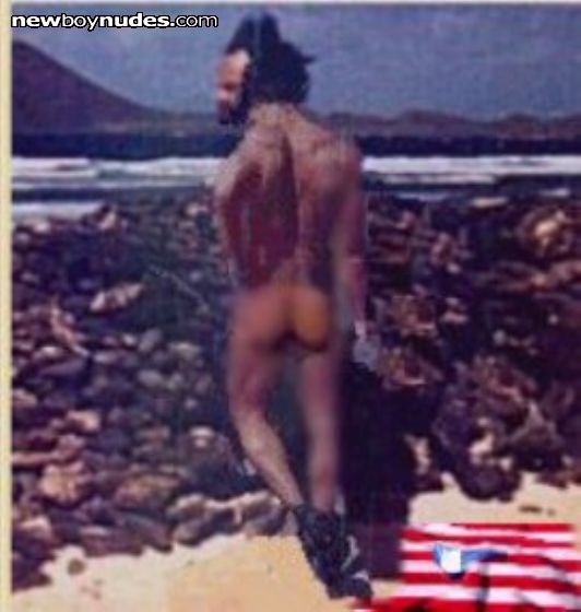 Beachwatching Fuerteventura - great place to get naked then watch the talent hidden by a windbreak