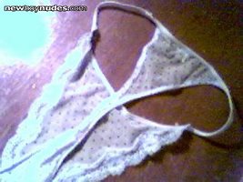 Here are another pair of my neighbor's wife's panties... Green thongs