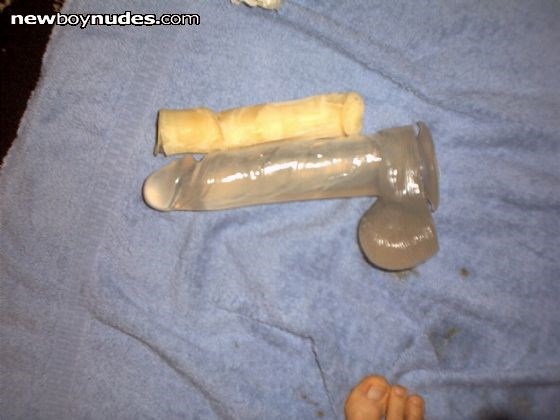 Uhoh! Comparison between the frozen cum slug and the dildo which just worked my hole out!!! I was now on a time limit since the slug would start to defrost once it was out of the freezer!!!