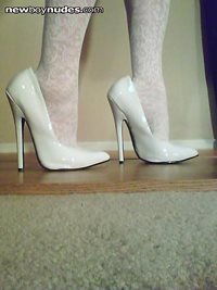 Showing Off in White ^ inch High Heels. Take a look at profile and Blog for...
