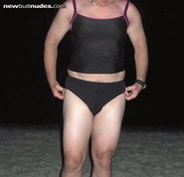 Photos of me, on the beach at night in a two piece swimsuit.