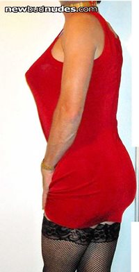 Available: hot, hungry cum queen in slinky little red dress