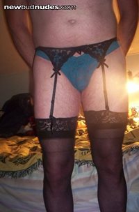 me in my new garter belt and stockings with a new thong and love it