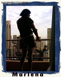 Enjoying the view in my Maid Outfit from a High Rise Hotel at the Gold Coas...