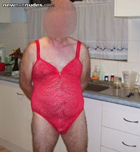 my friend wearing my red lace bodysuit in his mum's house.