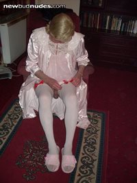 Sissy in pink fixing stockings