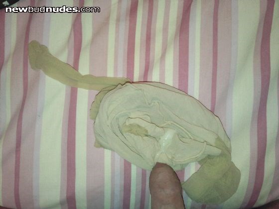 Dumping a fresh load in my mums tights.. they went back in the wash bin afterwards....