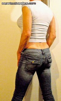 skinny slut has a little muffin top. she will have to work out more!