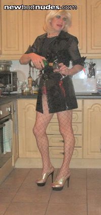 Nigella slut in her kitchen,fancy a glass of wine with me?