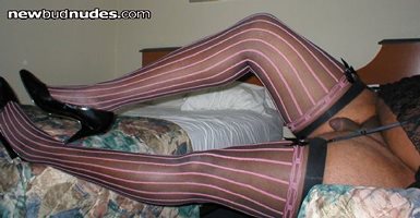 Pink nylons on bed