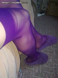 in purple stockings and slippers ,want your cum all over them
