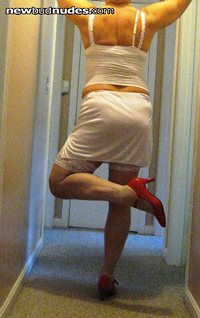 Virgin white lingerie with slut red heels.