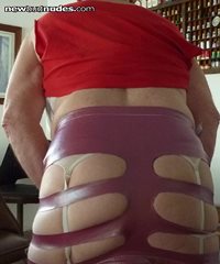 Real slutty in my mini skirt with slits in back. From rear showing GB
