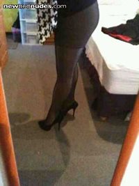 Wearing my sis in laws mini shrit and her black nylons and my black sexy hi...