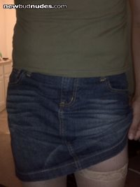 Dressed in a tank top and a short skirt - It fits nice (size 10)