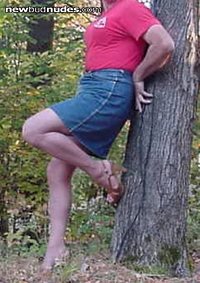 Just posing leaning on a tree.