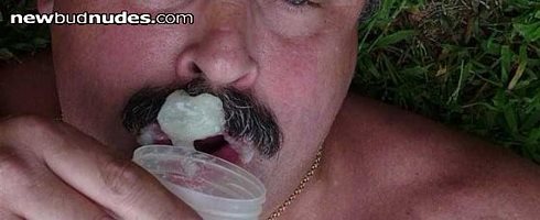 Pouring previously frozen cum into my mouth! It is nice and thick and tasty...