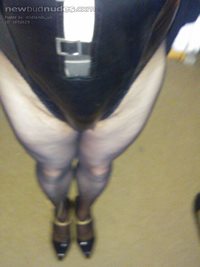 pvc body suit seamed sheer black tights and sexy heels what do you think