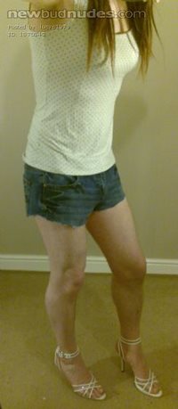 Lucy in white top, denim hotpants and strappy heels!!!