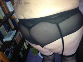 White hot pants and stockings With black lace underneath. PM me if you want...