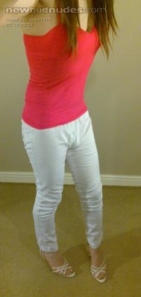 Lucy in pink vest, white jeans and strappy heels!!!
