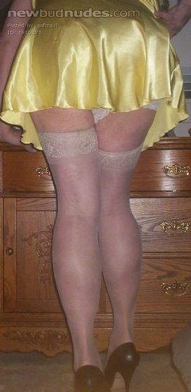 my yellow nightie that my wife just bought me.... heels (of course). Anyone want a piece of this?