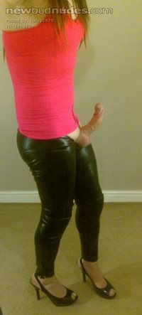 Lucy in pink top, black leggings and heels!!!