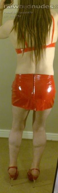 Lucy in red pvc bra, mini skirt and heels!!!