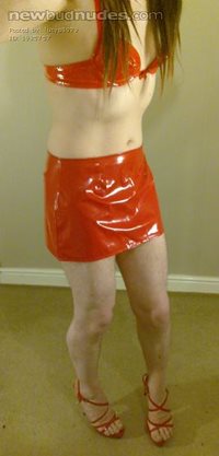 Lucy in red pvc bra, mini skirt and heels!!!