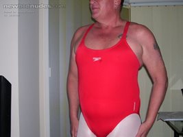 Harry wearing red swimsuit and pantyhose
