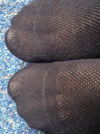 love my feet in socks,nylons etc love to have u suck them then cum all over...