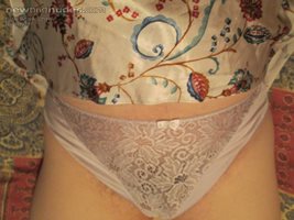 white panties on show under lifted nightie.