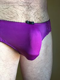i love these purple satin panties.  They feel so good and show a nice bulge...
