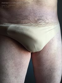wife's satin gold panties.  These feel so good and make me hard wearing the...