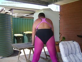 wearing daughters swimsuit and pantyhose