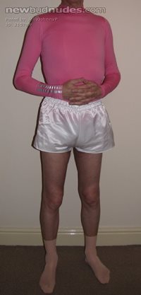 tight pink top and short shorts to attract the men.