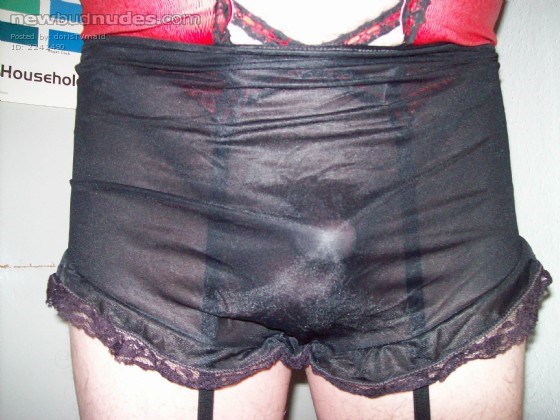 Wearing stockings and suspenders and French knickers
