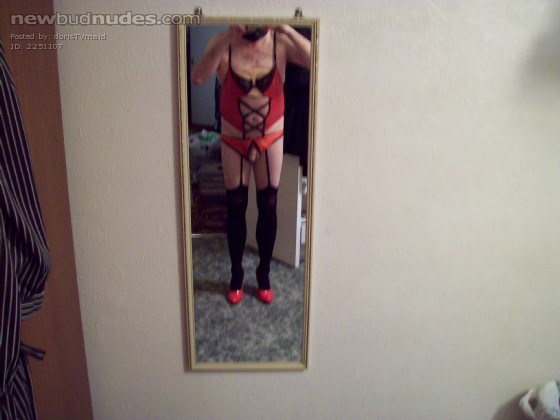 Red basque, red crotchless knickers and red heels