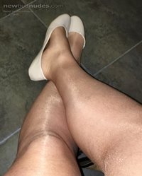 My new shiny nylons. Check back next week for more and hotter pics!